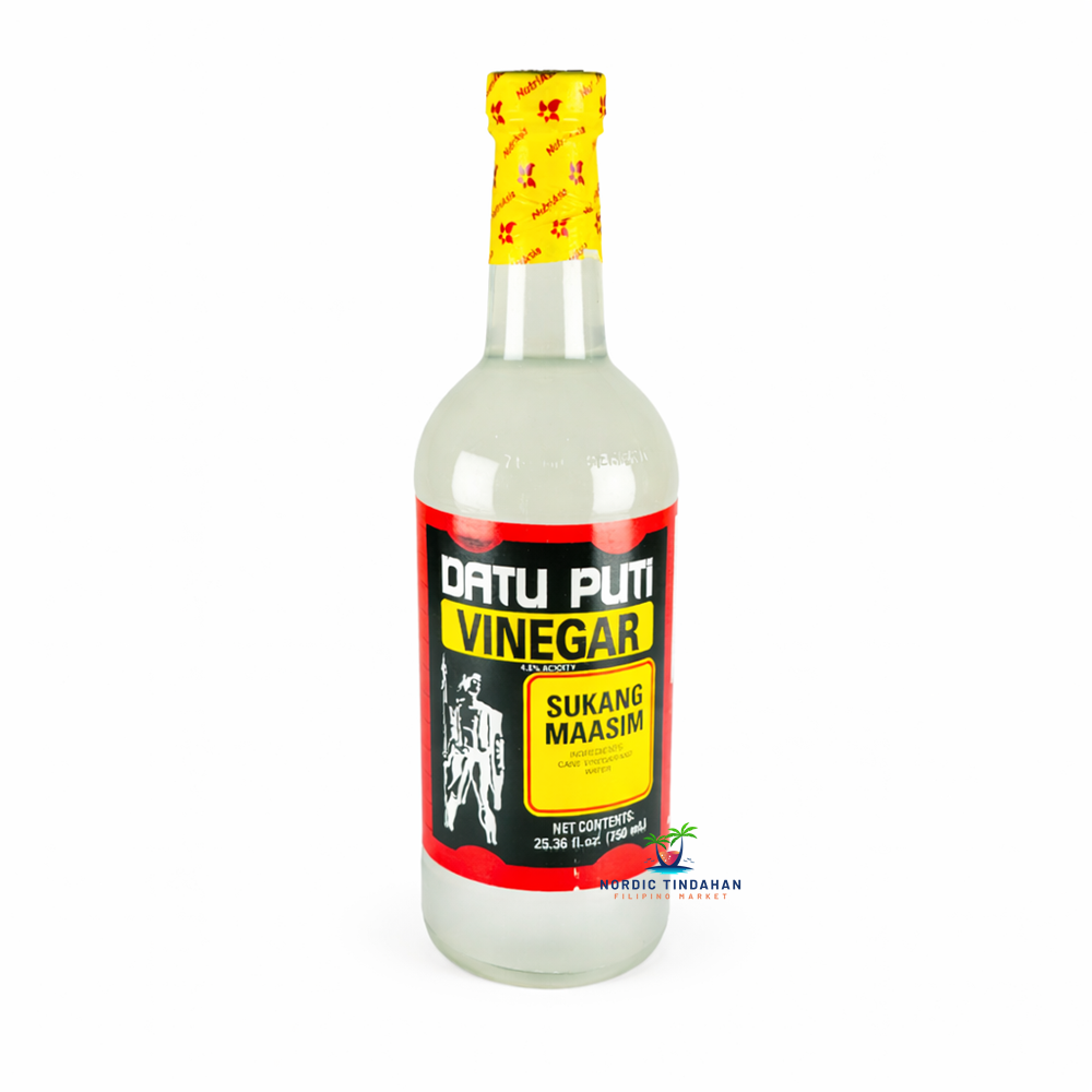 Datu Puti Vinegar 750ml – A traditional Filipino cane vinegar, naturally fermented to deliver a clean, crisp acidity, perfect for cooking, marinating, and dipping.
