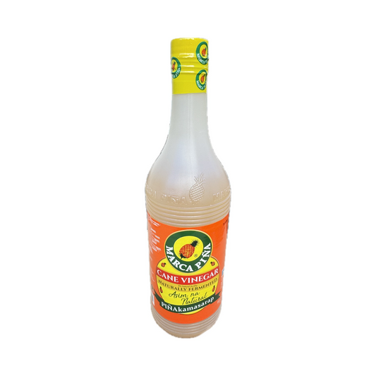 Marca Piña Cane Vinegar 1L bottle – pure sugarcane vinegar with a tangy flavor, ideal for marinades and Filipino dishes.