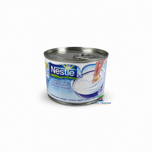 Create delicious desserts with Nestlé Dessert Cream 170g. This rich and creamy all-purpose cream has a smooth texture that's perfect for fruit salads, cakes, pastries, and other sweet treats. A versatile pantry essential for adding a luscious finish to your favorite homemade desserts.