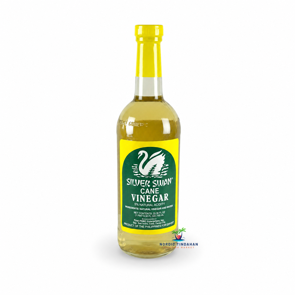 Silver Swan Cane Vinegar 750ml is a classic Filipino sugar cane vinegar with 5% natural acidity, perfect for authentic Asian cooking. Ideal for adobo, dipping sauces, marinades, pickling, and salad dressings, it adds a clean, tangy flavor to a wide variety of traditional Filipino recipes.